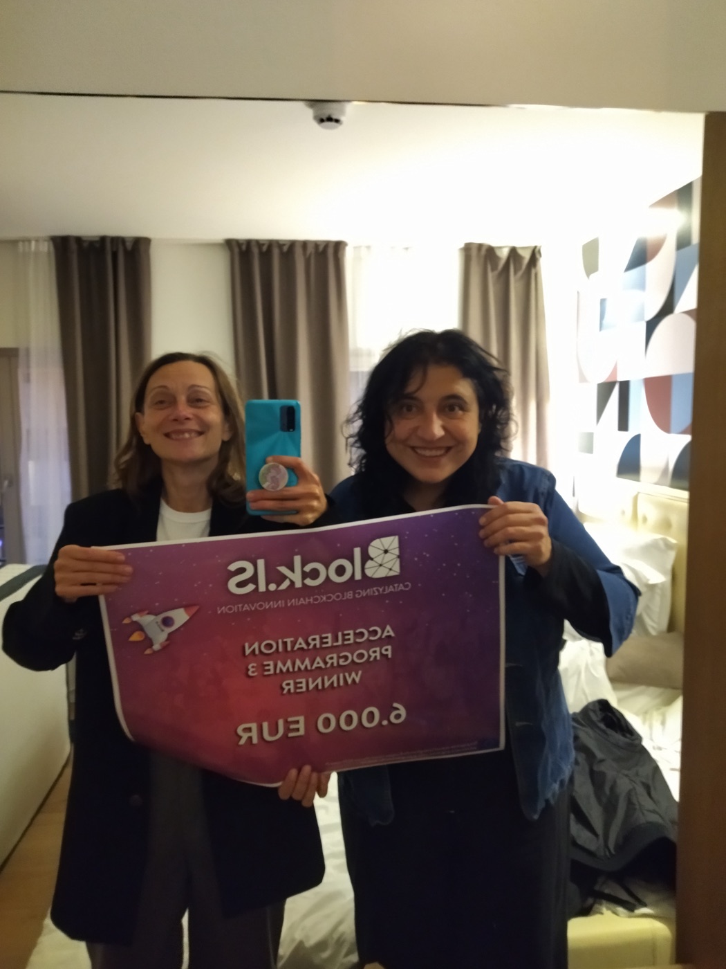 The na2na3 founders celebrating their Block.IS accelerator win
